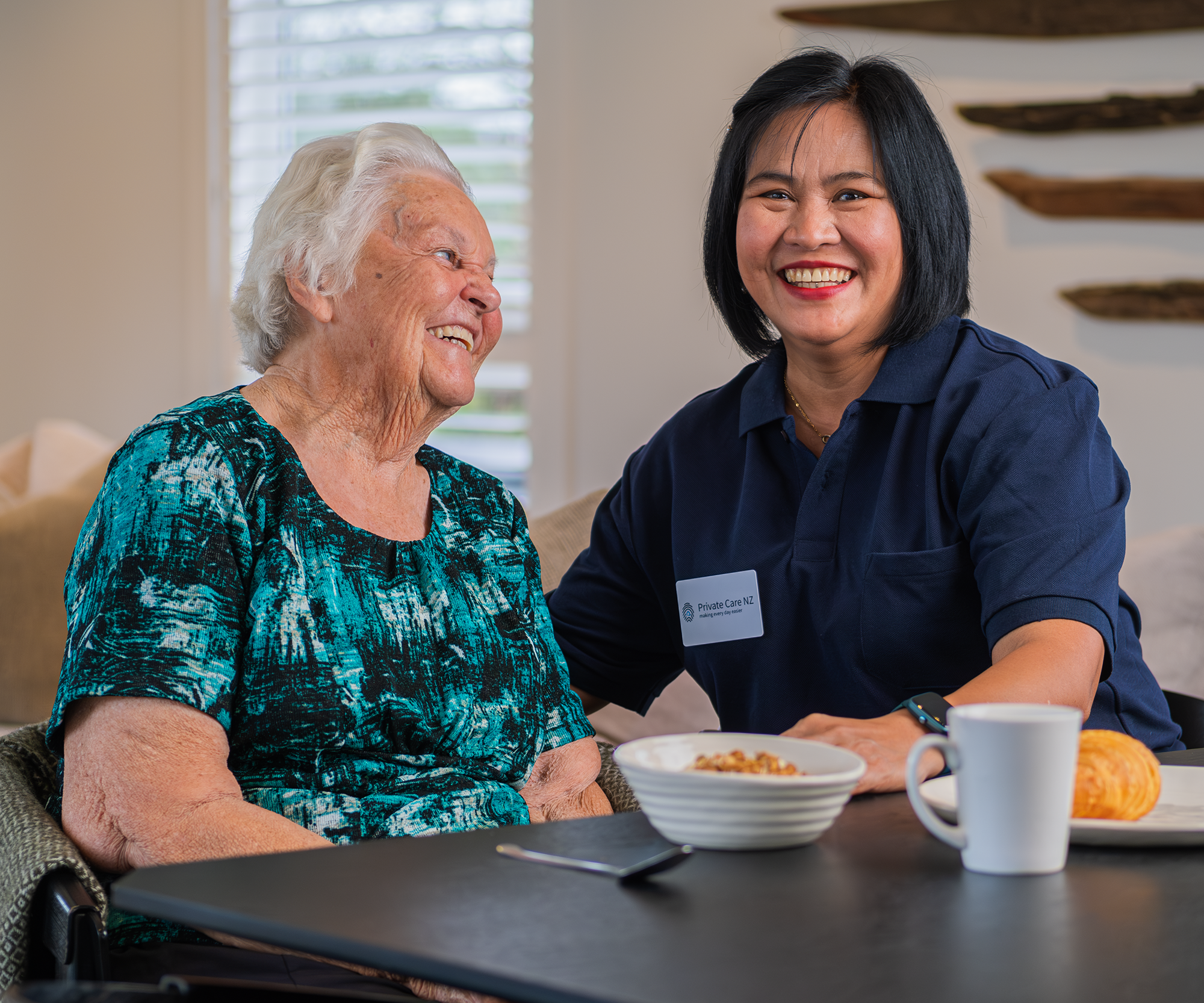 An elderly lady with her Private Care NZ carer.