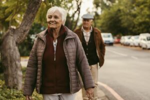 Senior couple goes for a walk on a winter day.